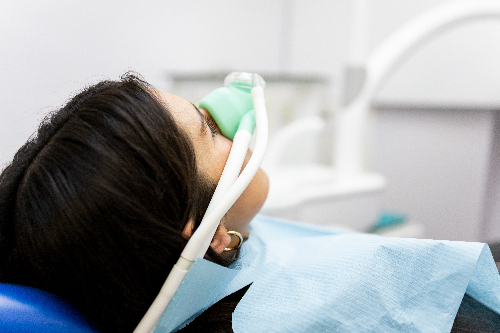 anxious patient undergoing sedation before a dental procedure