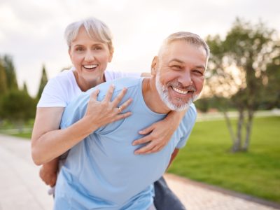 Clinton Township couple with porcelain dental veneers from Shelby Township cosmetic dentist